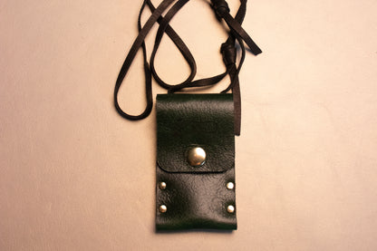 Green leather riveted thumb drive necklace.