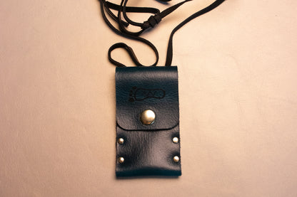 Blue leather riveted thumb drive necklace.